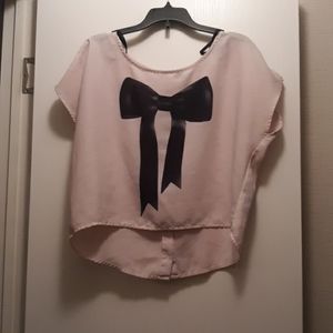 A Blouse with a Black Bow in the front
